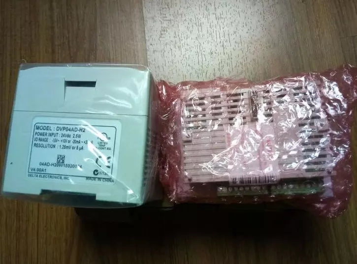 Delta DVP04AD-H2 PLC Module New One DVP04ADH2 Expedited Shipping DHL / UPS / FedEx